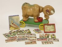 Lot 175 - A vintage plastic pull-along mooing cow