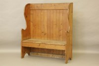 Lot 595 - An old pine pub bench