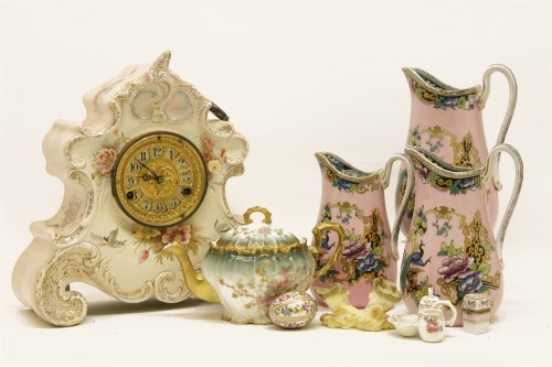 Lot 406 - A Continental porcelain mantle clock