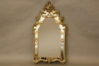 Lot 509 - A gilt framed wall mirror