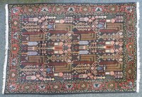 Lot 547 - Persian hand knotted rug
