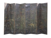 Lot 555 - A large painted leather eight-leaf screen