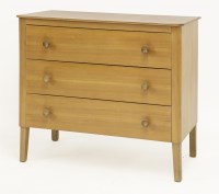 Lot 317 - A Gordon Russell walnut chest of three drawers