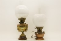 Lot 187 - Two late nineteenth century copper and brass oil lamps