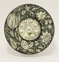 Lot 637 - A Fornasetti circular 'Flowers of the Night' wall mirror