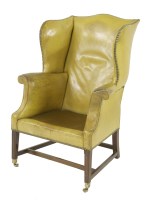 Lot 646 - A George III wing armchair