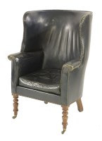 Lot 647 - A George III tub armchair