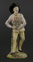 Lot 49 - An English ceramic harlequin figure