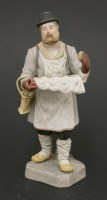 Lot 65 - A Russian biscuit porcelain figure