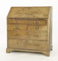 Lot 576 - A walnut and featherbanded bureau