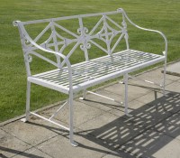 Lot 644 - A Regency-style garden bench