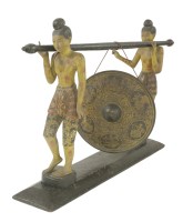 Lot 659 - A carved wood and painted dinner gong