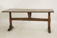 Lot 510 - A pine top trestle refectory table