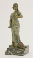 Lot 145 - A patinated bronze figure