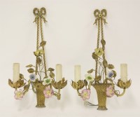Lot 183 - A pair of French brass and porcelain twin branch wall lights
