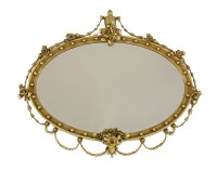 Lot 593 - An Adam-style oval wall mirror