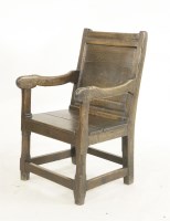 Lot 523 - An oak joined armchair