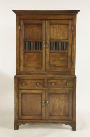 Lot 525 - A George lll oak cheese cupboard