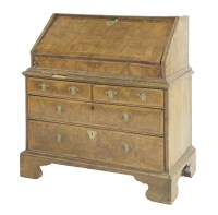 Lot 608 - A George I walnut fall front bureau