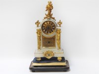 Lot 232 - A 19th century alabaster and gilt metal mounted mantel clock