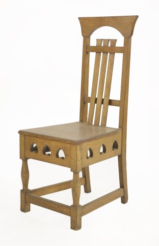 Lot 35 - An Arts & Crafts oak hall chair