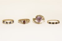 Lot 7 - A 9ct gold sapphire and diamond wishbone ring