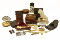 Lot 102 - A box containing carved Meerschaum pipes
