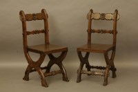 Lot 2033 - A pair of Gothic revival oak hall chairs