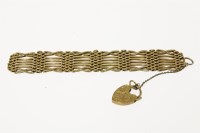 Lot 6 - A gold eight bar gate link bracelet
