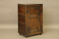 Lot 556 - An 18th century oak cupboard