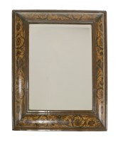 Lot 517 - A marquetry cushion frame mirror