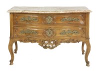 Lot 606 - A Louis XV marble top walnut commode