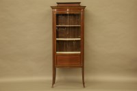 Lot 561 - An Edwardian mahogany inlaid display cabinet