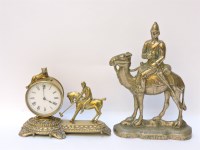 Lot 407 - A brass door porter