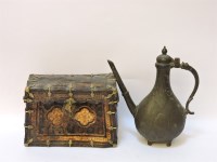 Lot 452 - A metalwares qajar ewer