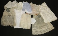 Lot 1206 - A collection of antique and later christening gowns and children's clothes