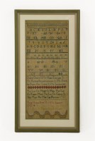 Lot 1207 - An early embroidered band sampler