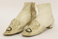 Lot 1422 - A pair of ladies' white kid leather boots
