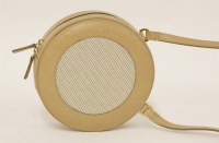 Lot 1101 - A Bulgari round cream leather and fabric shoulder handbag
