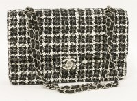 Lot 1021 - A Channel classic double flap quilted tweed medium flap handbag