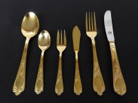 Lot 1251 - A collection of SBS Solingen gilt cutlery in a briefcase