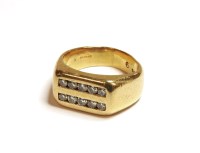 Lot 1144 - An 18ct gold gentleman's two row diamond ring