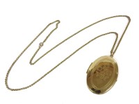 Lot 1139 - A 9ct gold oval locket