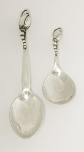 Lot 32 - Two Georg Jensen silver ‘Blossom’ pattern spoons
