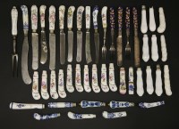 Lot 9 - A collection of pottery and porcelain knife and fork handles