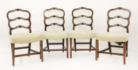 Lot 411 - A set of four George III mahogany dining chairs