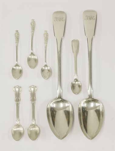 Lot 71 - A pair of George III silver fiddle pattern basting spoons