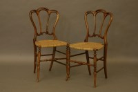 Lot 2109 - A pair of Victorian walnut side chairs