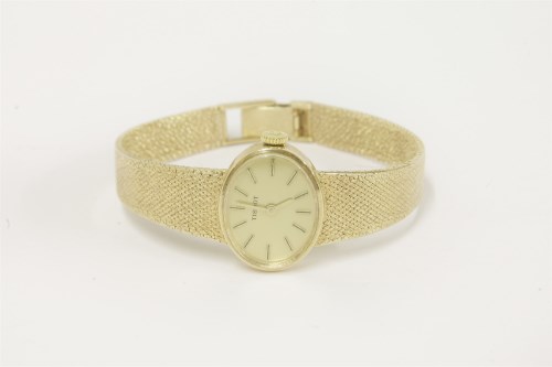 Lot 7 - A ladies 9ct gold Tissot mechanical bracelet watch