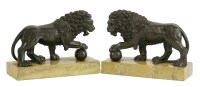 Lot 169 - A pair of bronze Medici lions